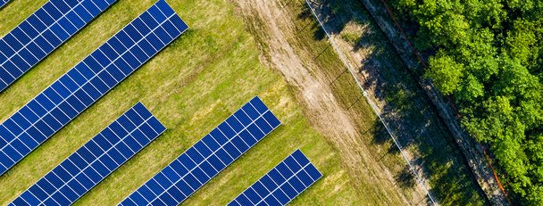 Solar panels in rows on a solar farm
