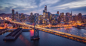 Aerial cityscape view of San Francisco and the Bay Bridge at Night, California, USA