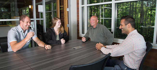 Diverse group of employees in a meeting